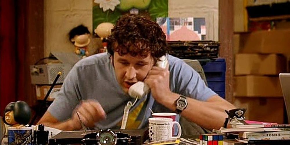 Roy talking on the phone in The IT Crowd
