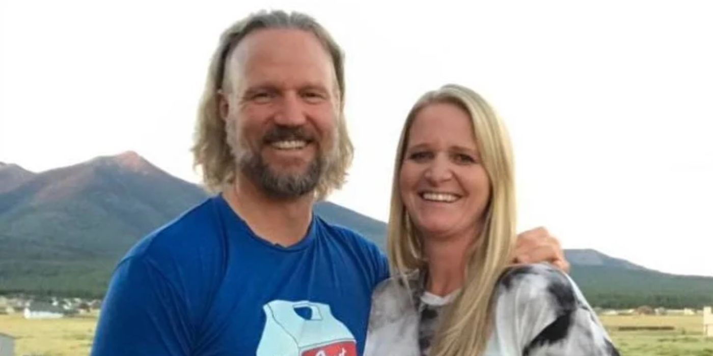 Kody Brown with Christine Brown on Sister Wives posing outside with mountain backdrop