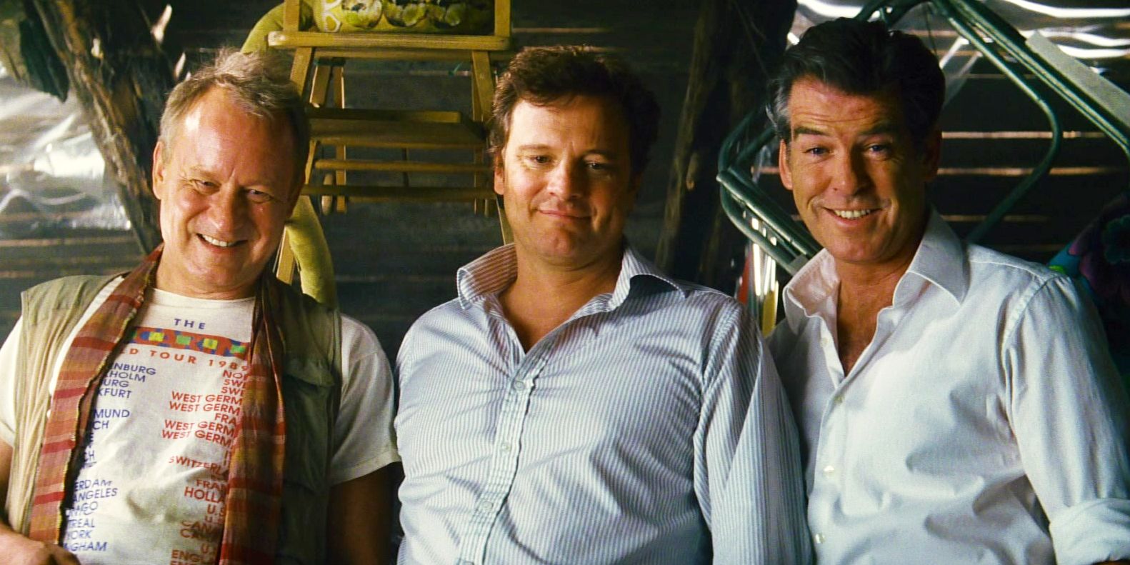 Sam, Harry, and Bill looking down and smiling in Mamma Mia!