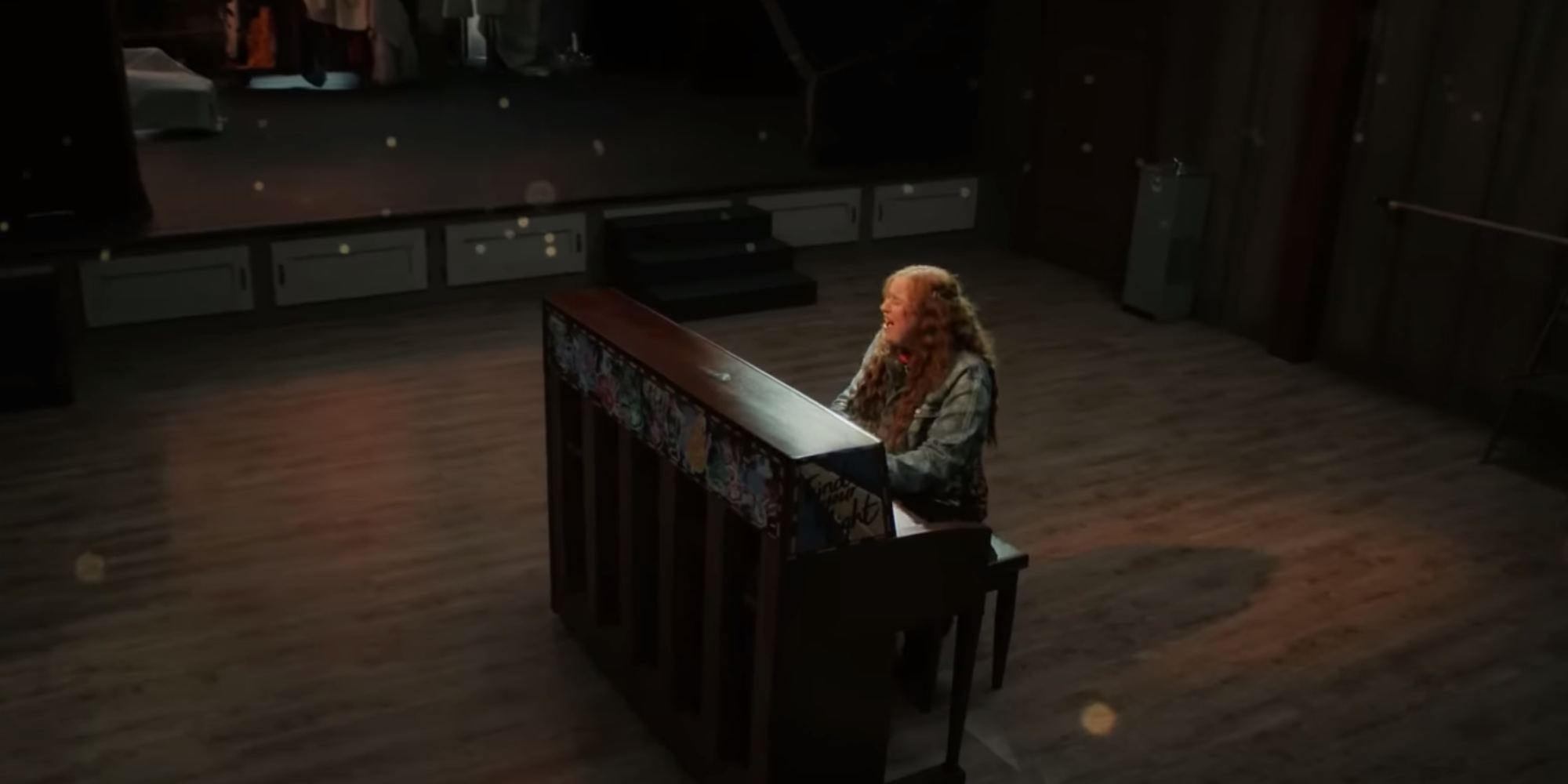 Ashlyn playing the piano and performing 