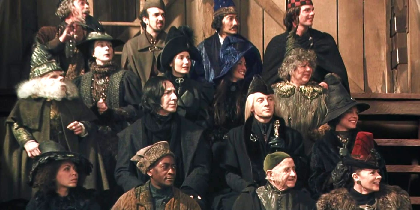 Snape e Lucius Malfoy assistindo Quadribol em Harry Potter e a Câmara Secreta