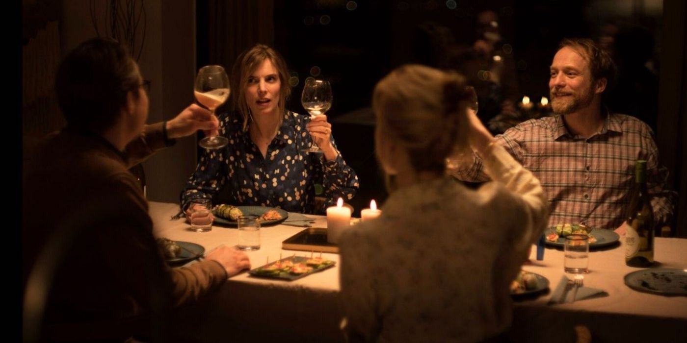 Patrick, Karin, Louise and Bjorn share a meal around the family table in Speak No Evil
