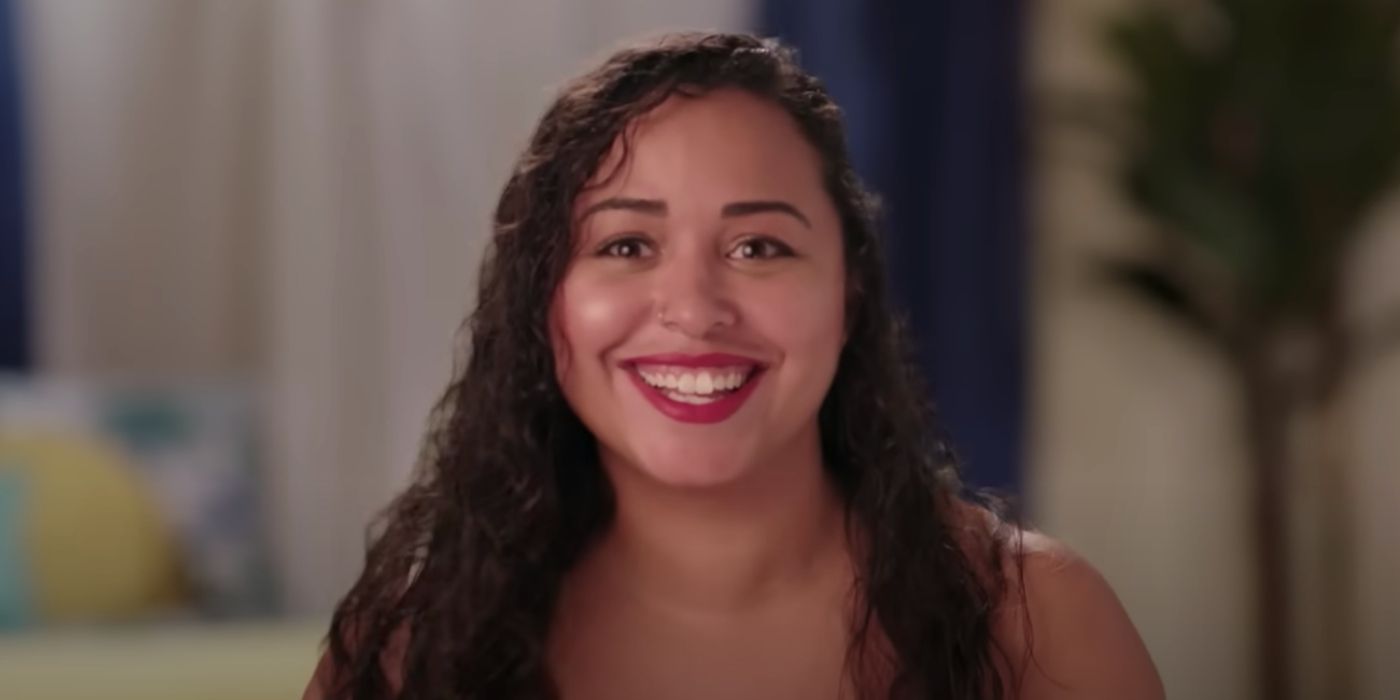 Tania Maduro from 90 Day: The Single Life season 3 smiling red lipstick
