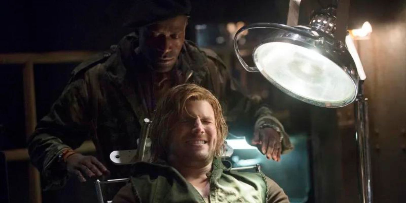 The Butcher looms over Oliver Queen in Arrow