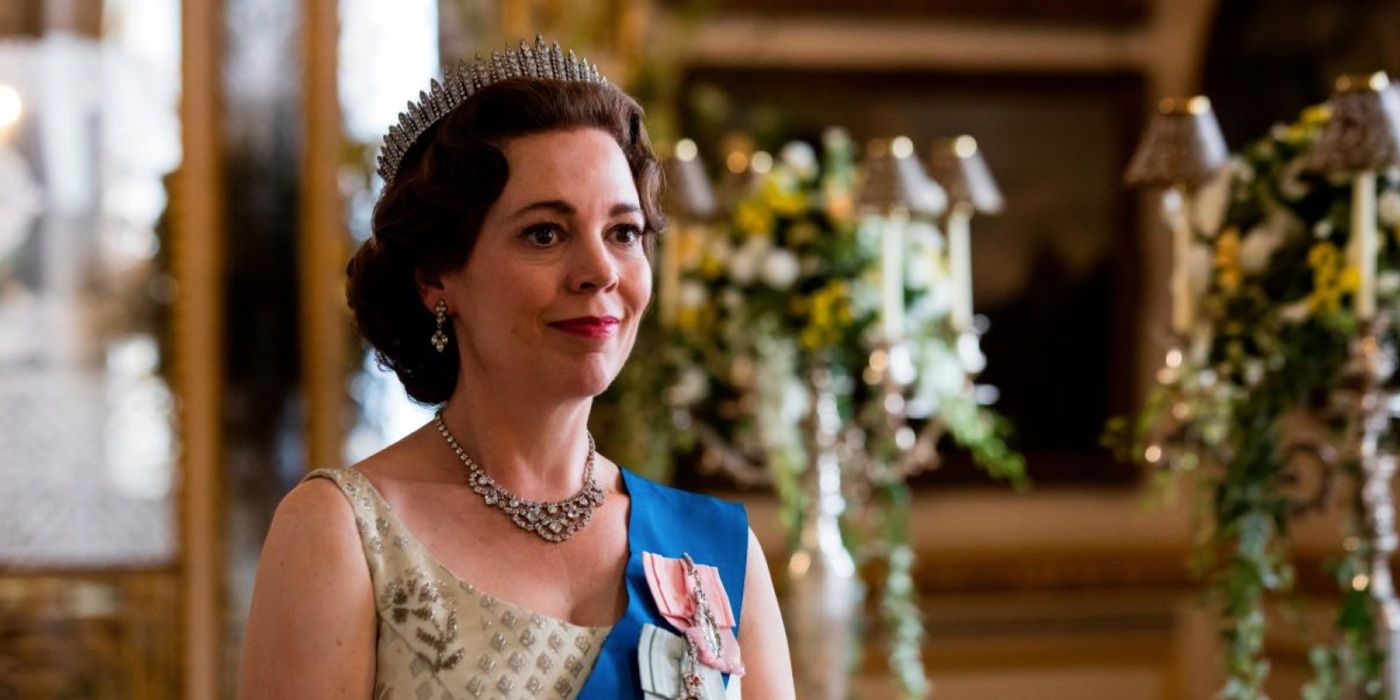 Olivia Colman as Queen Elizabeth smiling in The Crown 