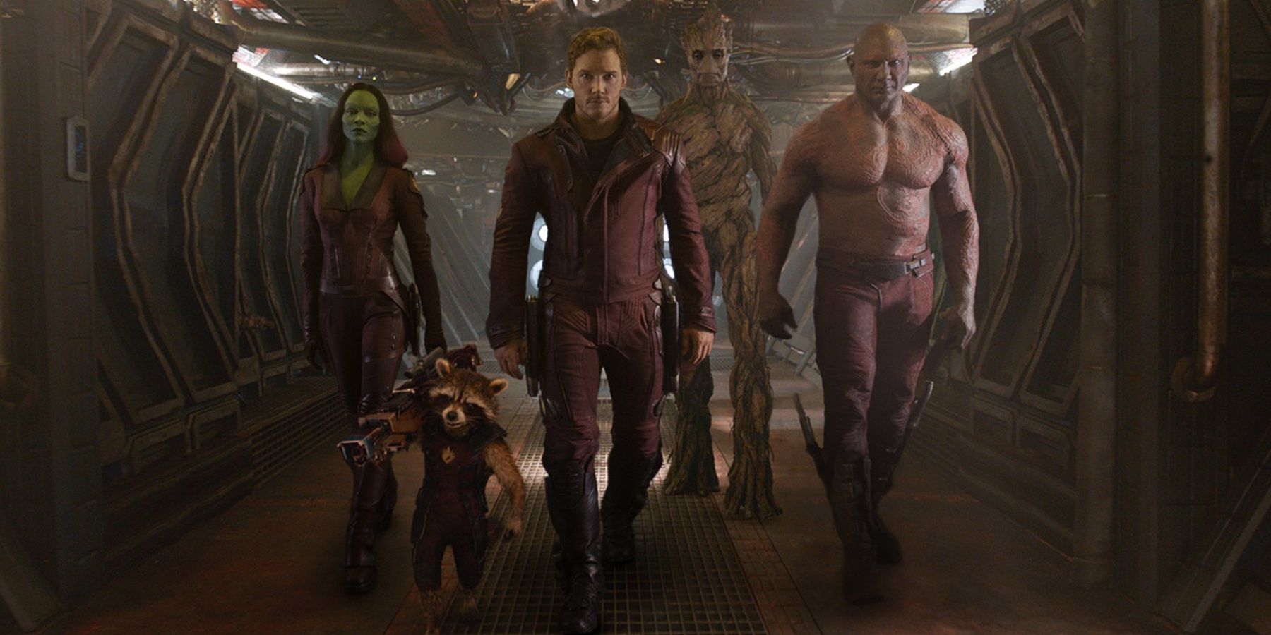 The Guardians of the Galaxy walk down a hallway