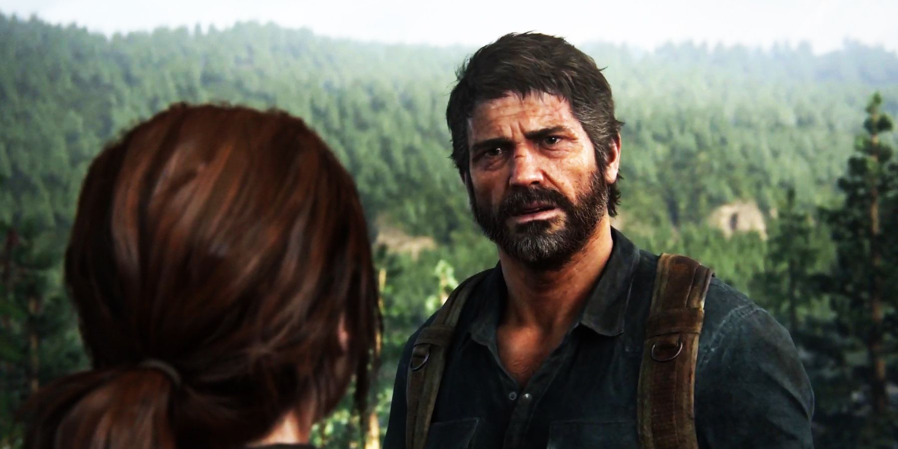 Uma imagem olhando por cima do ombro de Ellie enquanto ela fala com Joel em The Last of Us Part 1.