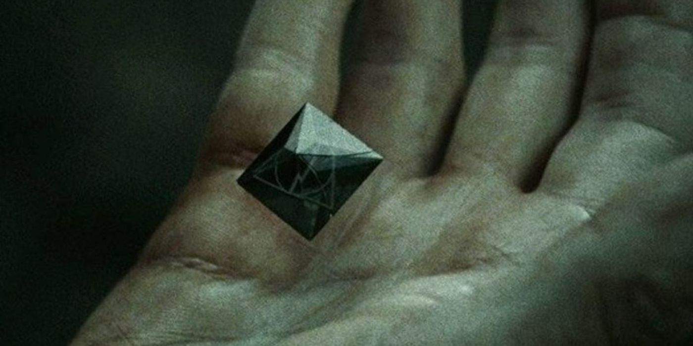 Harry holding the Resurrection Stone in Harry Potter