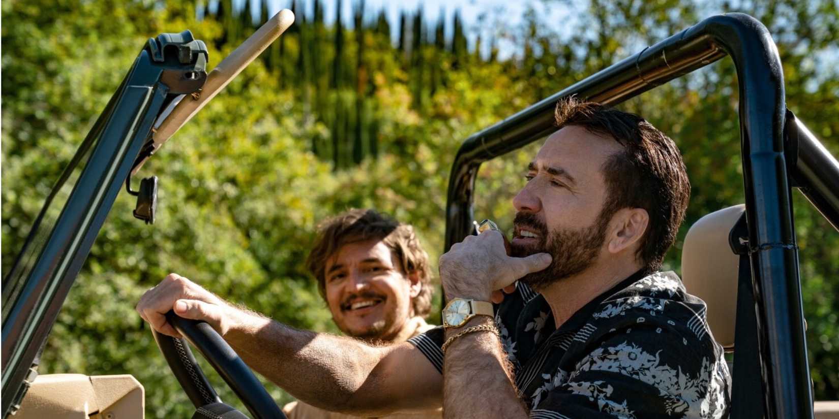 NIck Cage and Javi driving in The Unbearable Weight Of Massive Talent (2022)