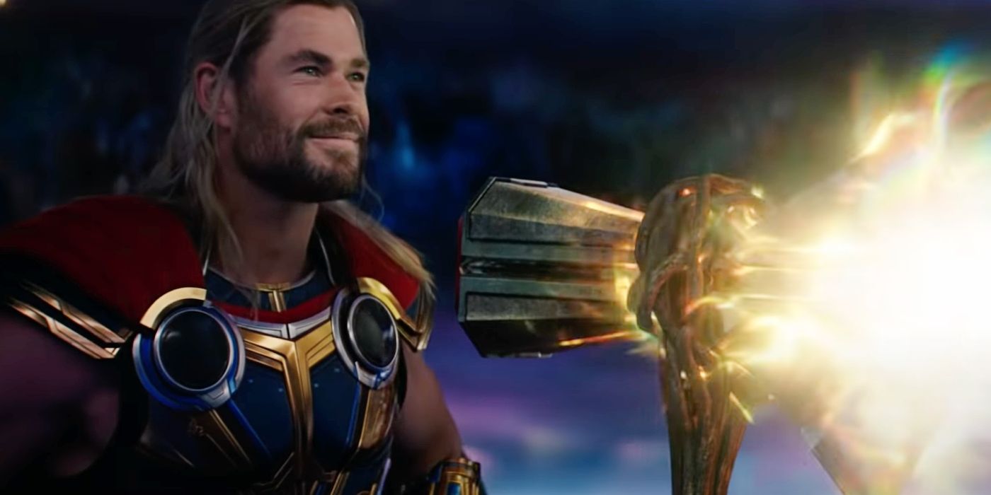 Thor smiling while holding Stormbreaker in Thor: Love and Thunder.