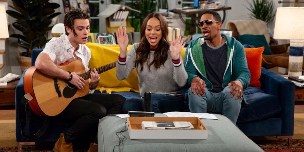 Three people singing in their house in Happy Together