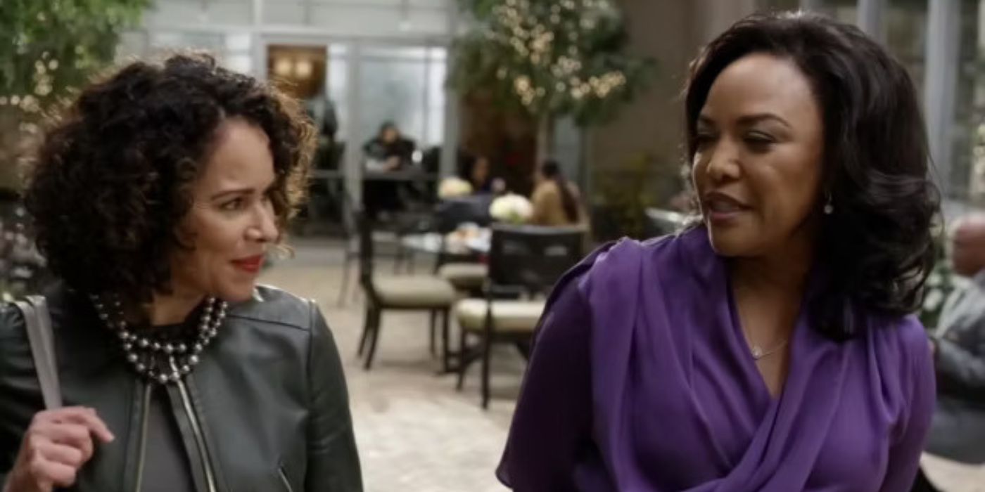 Two women looking and talking to each other in Greenleaf