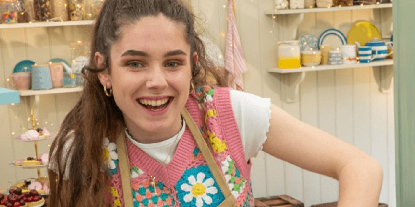 Freya batendo ingredientes na tenda Great British Bake Off