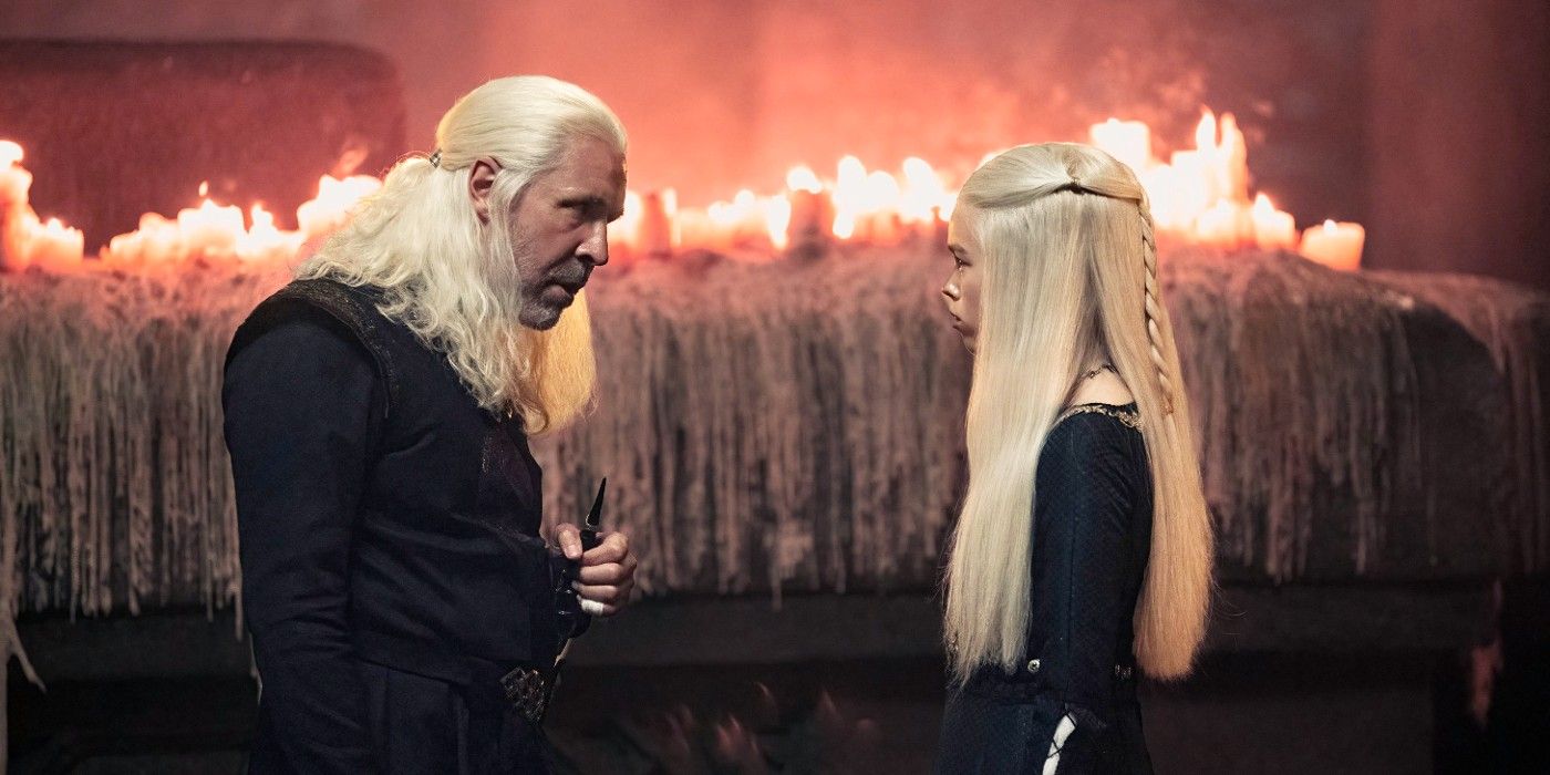 Viserys e Rhaenyra conversando na sala das caveiras em House for the Dragon