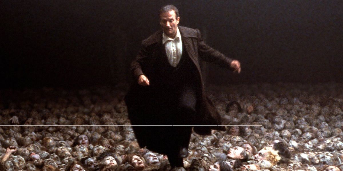 Robin Williams runs across a plateau of faces in What Dreams May Come 