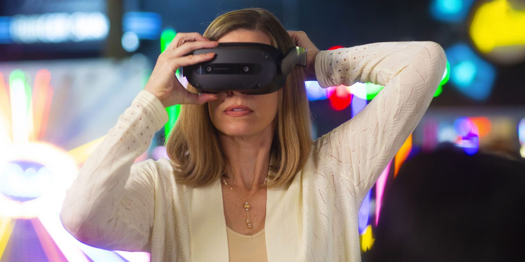 Woman wearing Lenovo ThinkReality VRX VR Headset