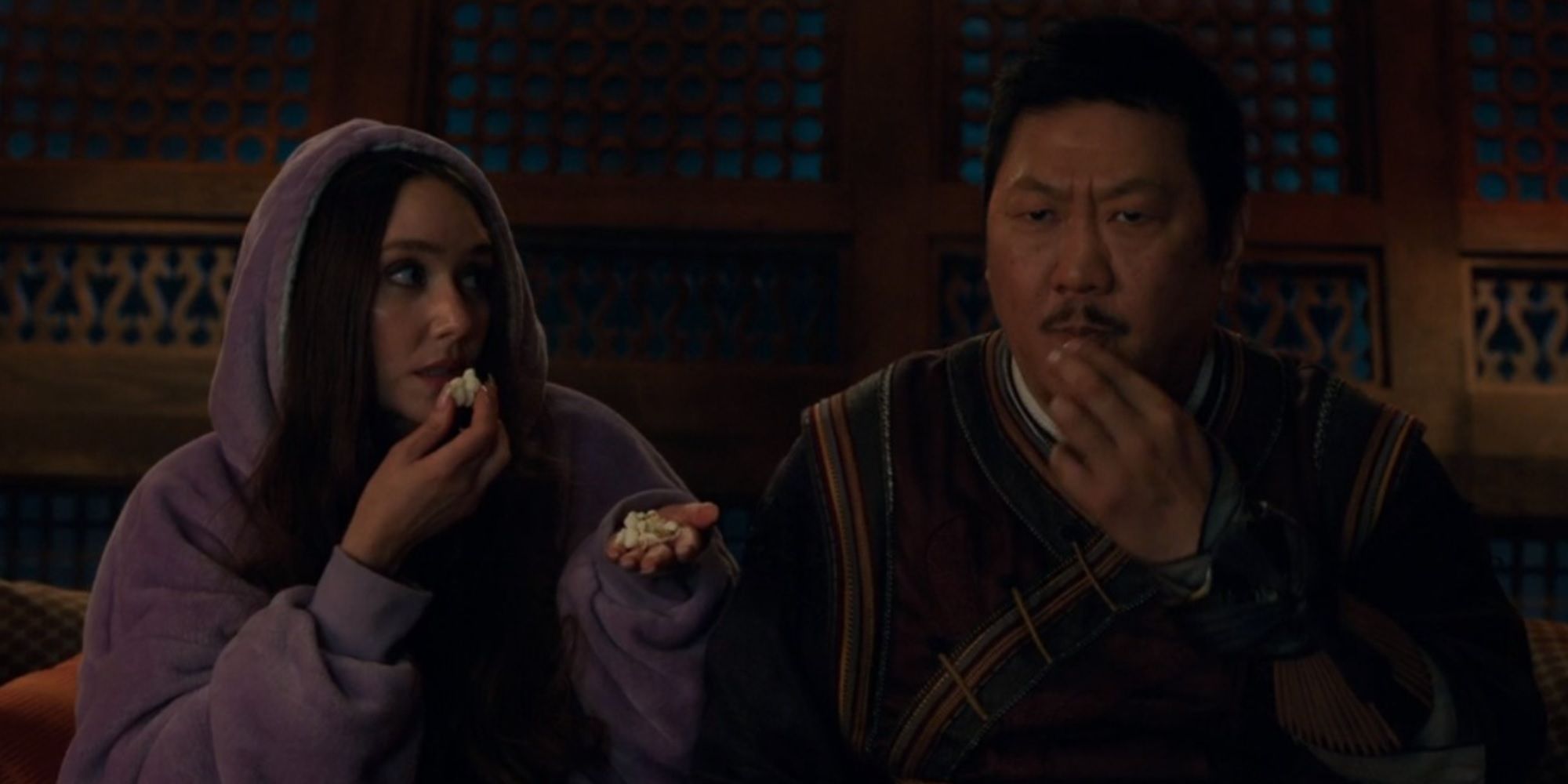 Wong and Madisynn eating popcorn in She-Hulk Attorney at Law