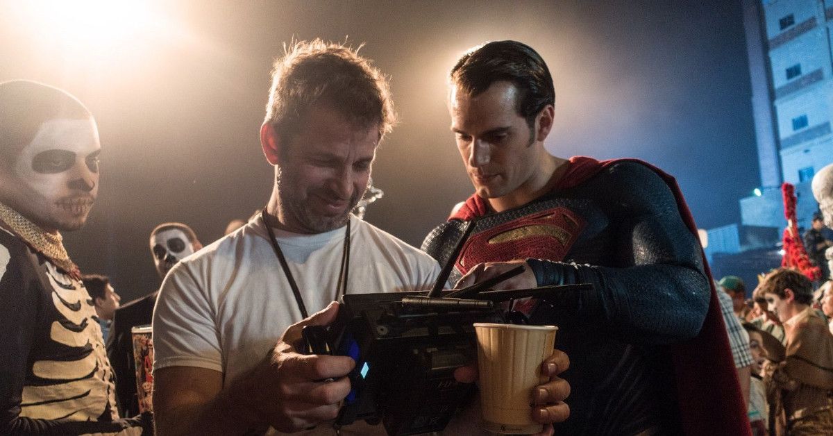 Zack Snyder watches a take with Henry Caville