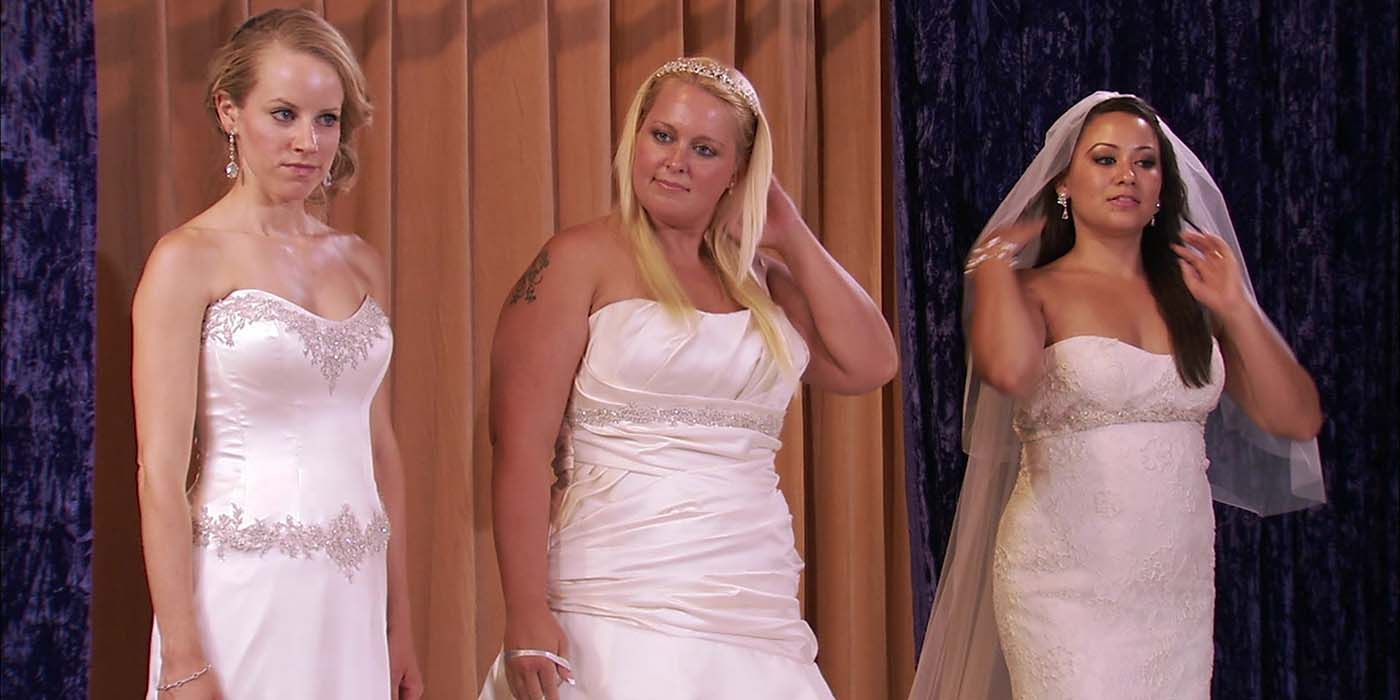 Three women in wedding dresses from a scene in the reality show Bridalplasty