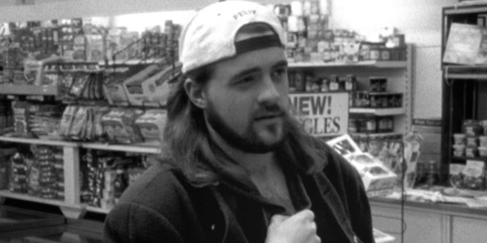 Silent Bob gives Dante advice at the check-out counter in Clerks