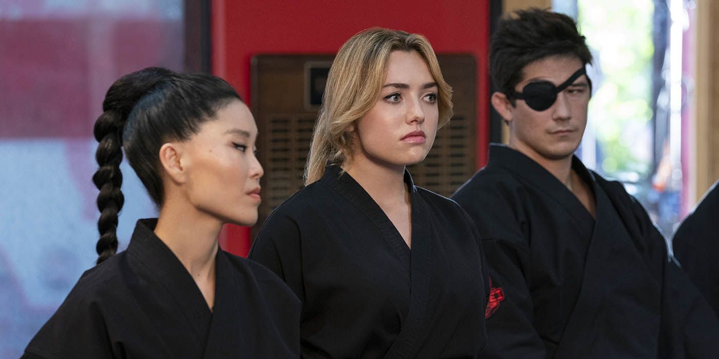 Kim Da-Eun (Alicia Hannah-Kim) and Tory Nichols (Peyton List) in full uniform on Cobra Kai.