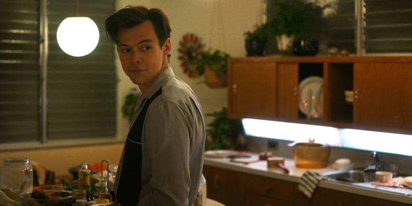 Harry Styles smiling in Don't Worry Darling.