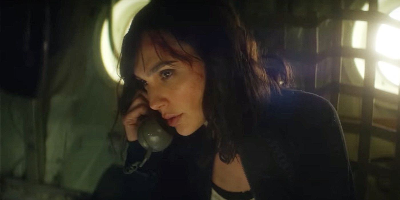 Gal Gadot talks on the phone in Heart of Stone