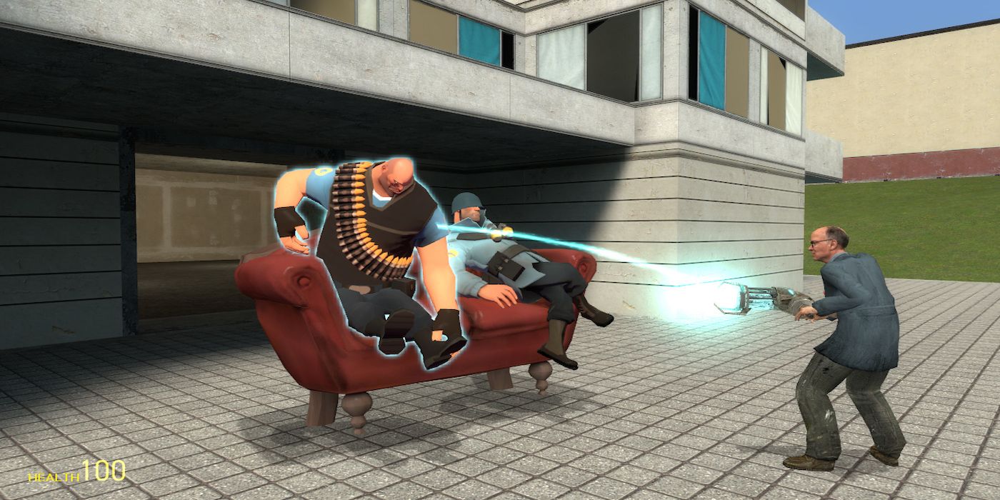 Uma captura de tela do jogo Garry's Mod mostrando uma arma gravitacional sendo usada no Heavy do TF2.