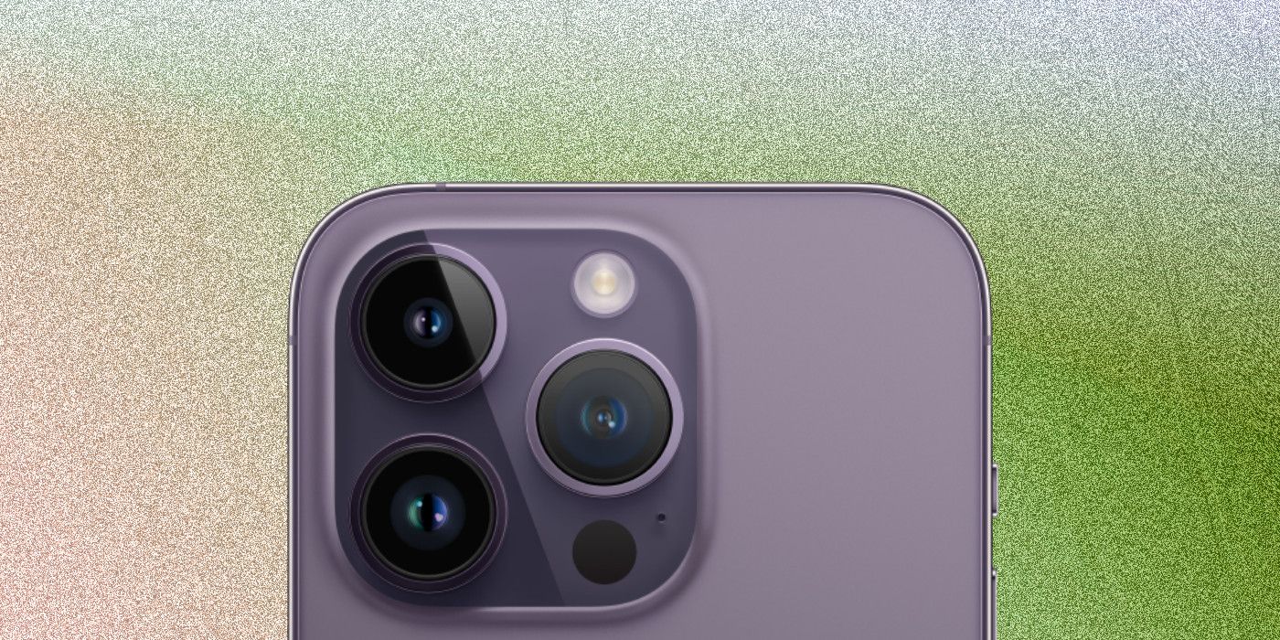 Close-up of iPhone 14 Pro camera on custom gradient background