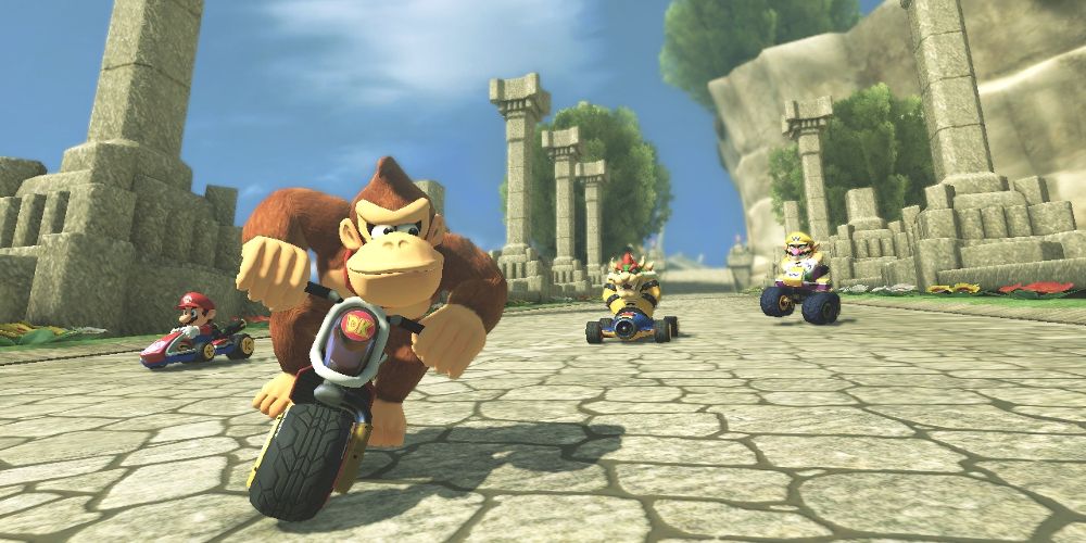 Donkey Kong drives through Thwomp Ruins in Mario Kart 8