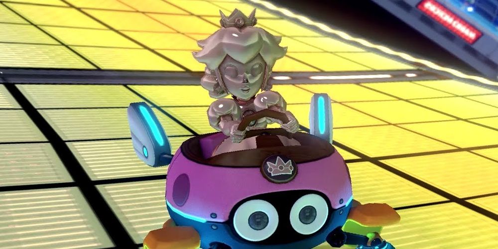 Pink Gold Peach drives a Biddy Buggy in Mario Kart 8