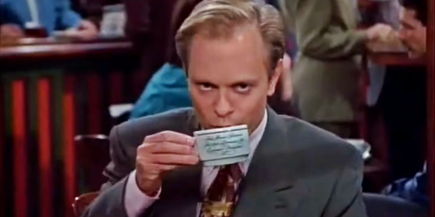 Niles Crane (David Hyde Pierce) drinks from a coffee mug on Frasier.