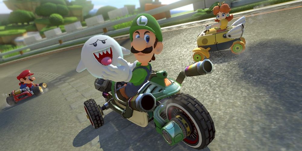 Luigi memegang hantu di Mario Kart 8 Deluxe