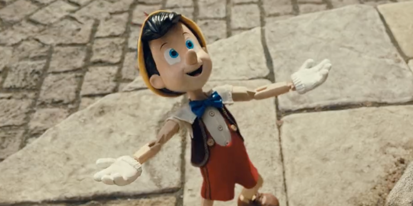 Pinocchio looking up and smiling in the 2022 movie.