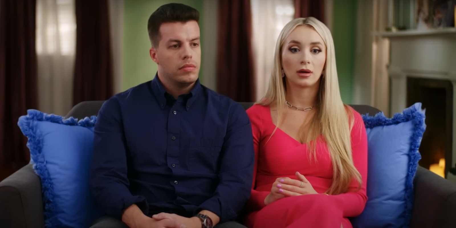 90 Day Fiance's Yara Zaya and Jovi Dufren sitting on couch looking serious