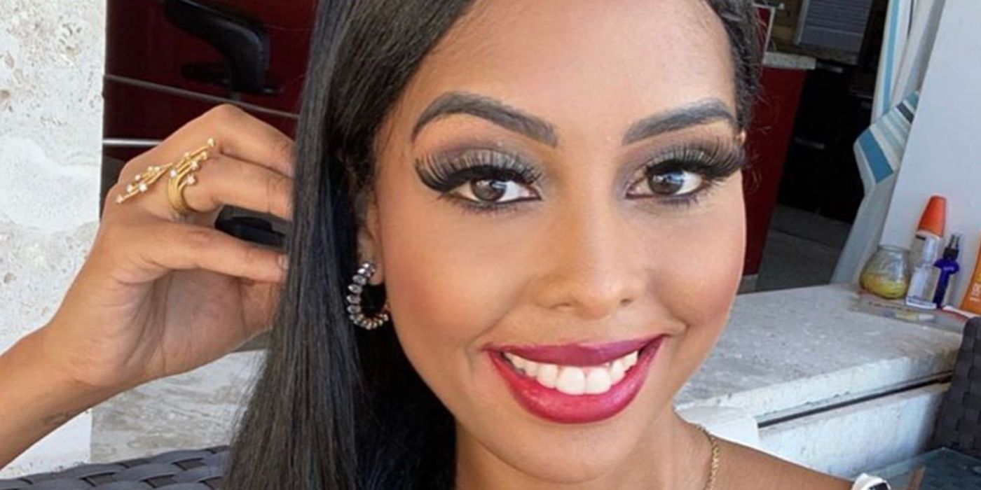 The Family Chantel Nicole Jimeno closeup selfie smiling with heavy makeup hand on head in the bathroom