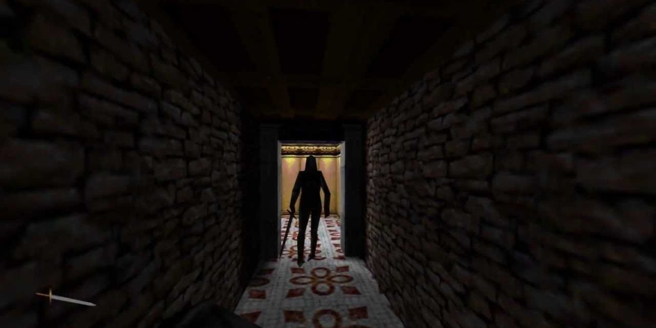 A figure stands at the end of the corridor in Thief The Dark Project 