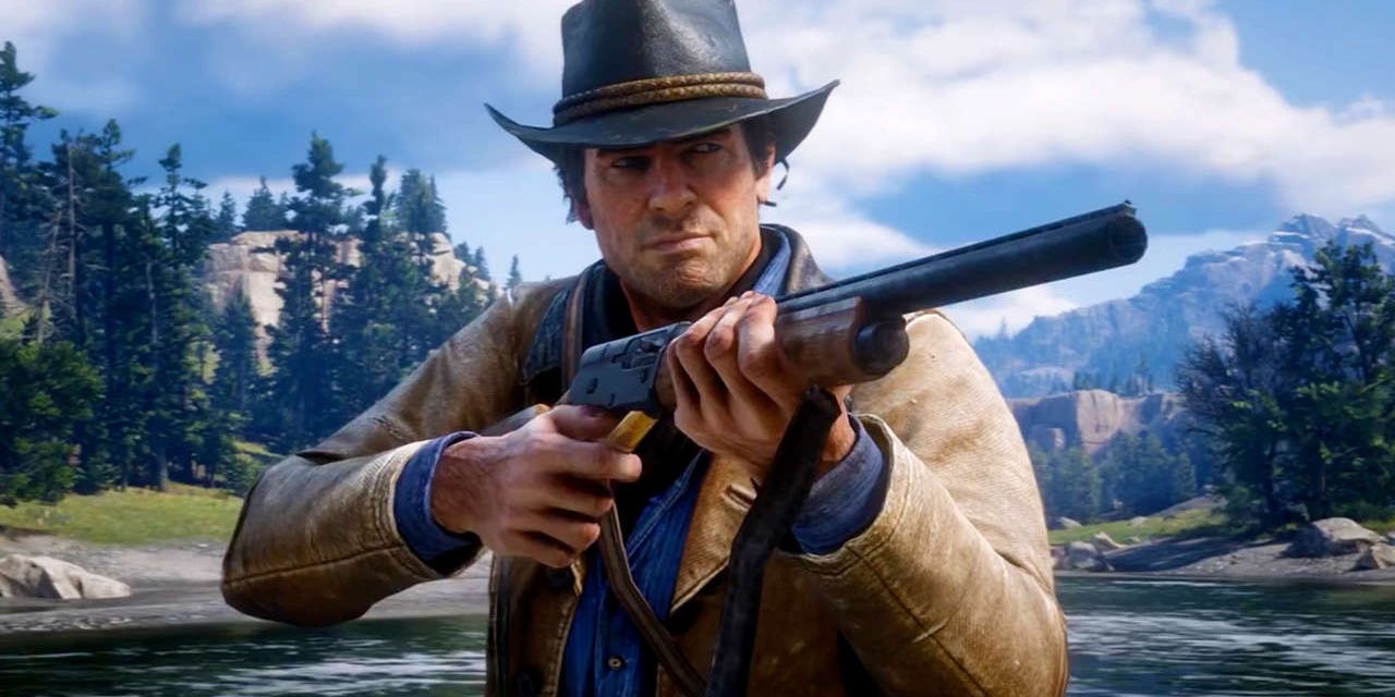 A man holds a gun in the forest in Red Dead Redemption 2 