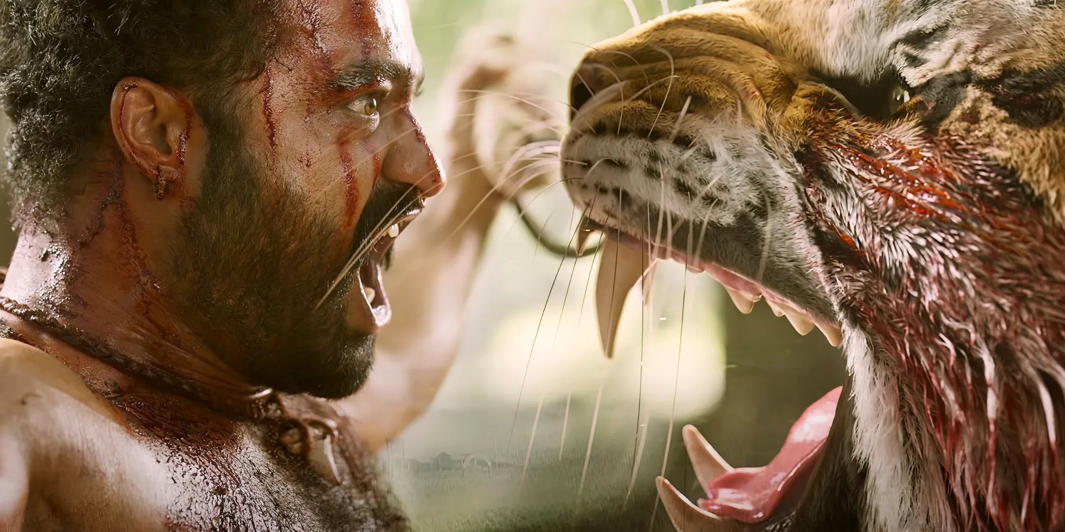 A man screams at a tiger in RRR