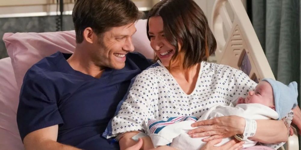 Amelia and Link with their baby in Grey's Anatomy