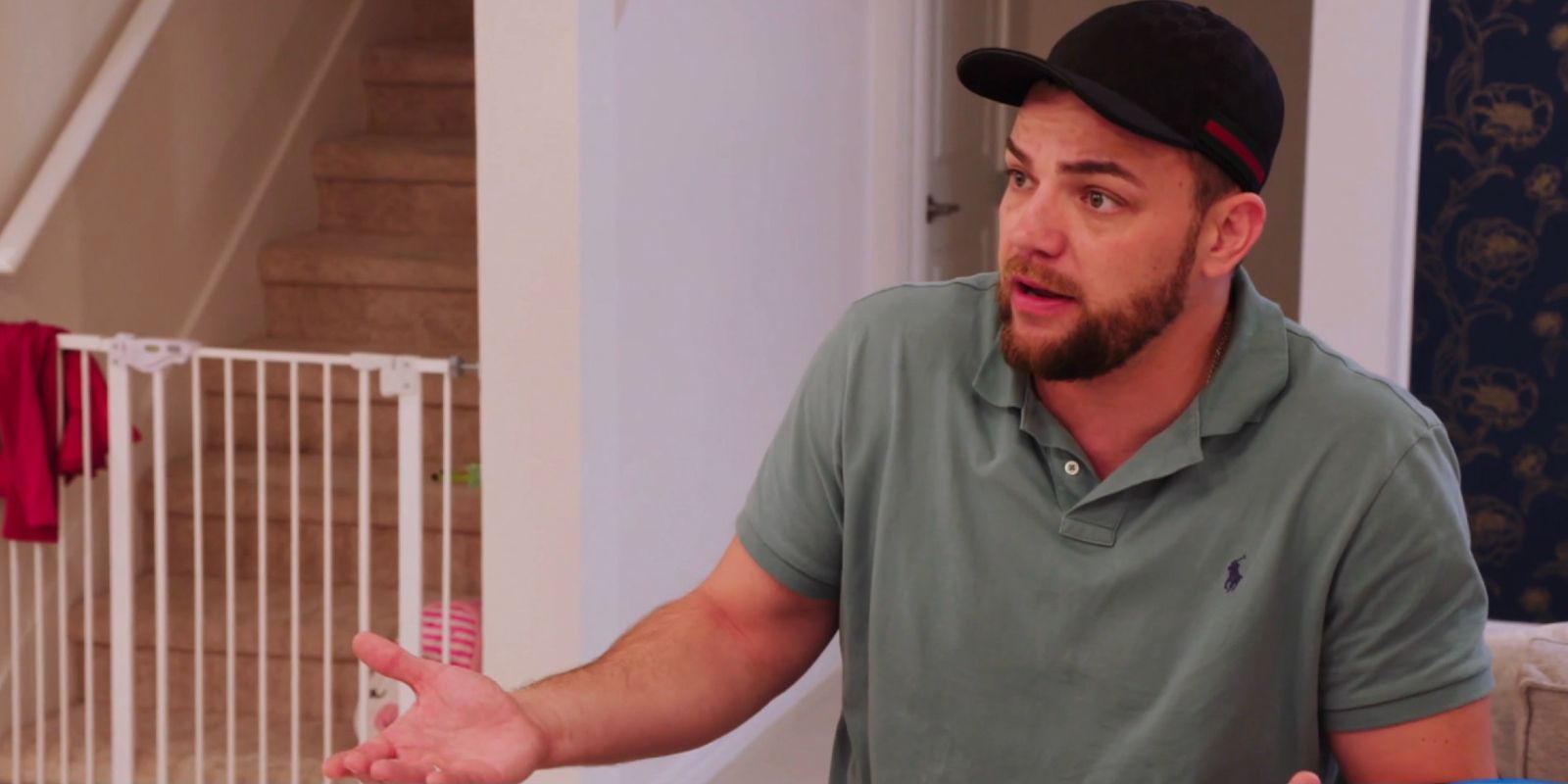 Andrei Castravet from 90 Day Fiancé: Happily Ever After wearing green shirt and cap