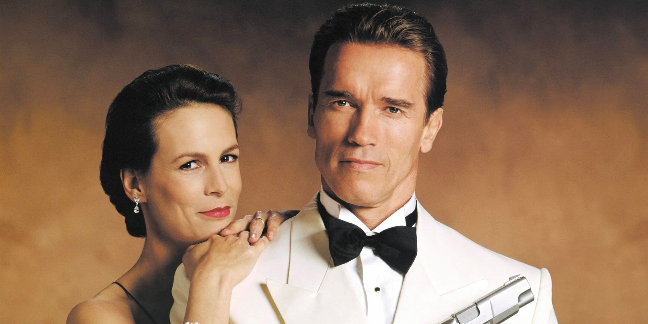 Arnold Schwarzenegger e Jamie Lee Curtis no pôster de True Lies