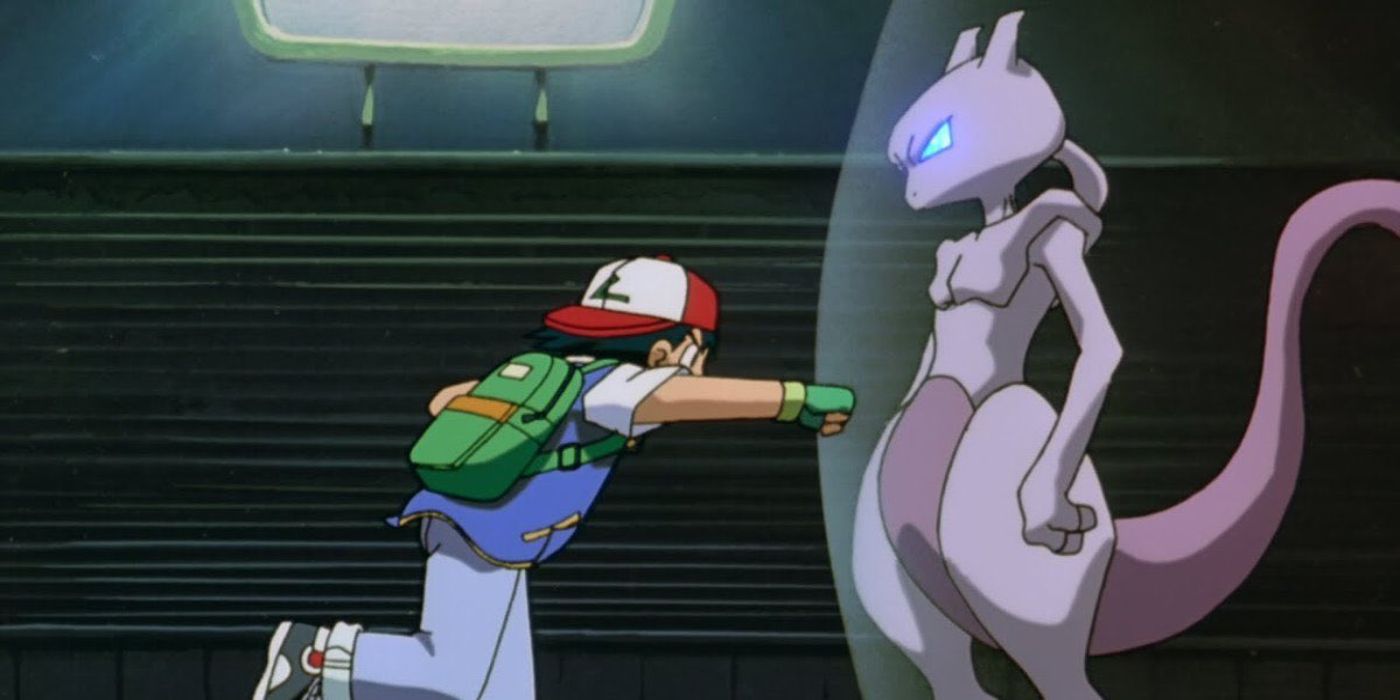 Ash Punching Mewtwo in the stomach.