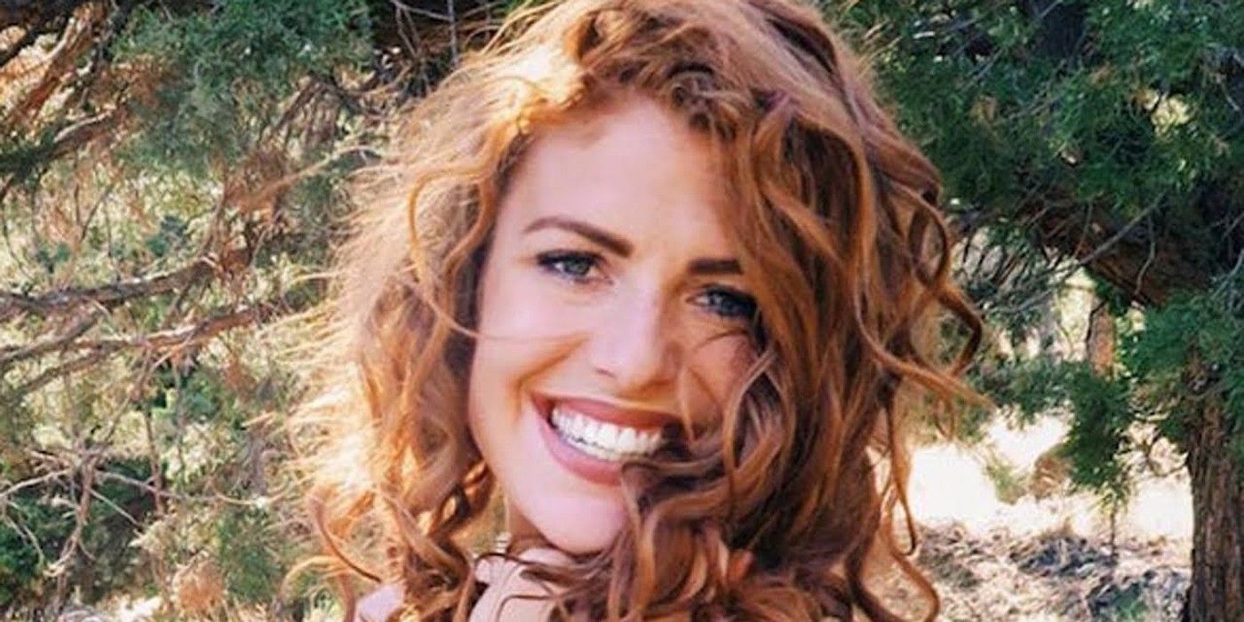 Audrey Roloff from LPBW posing outdoors with wavy hair and smiling