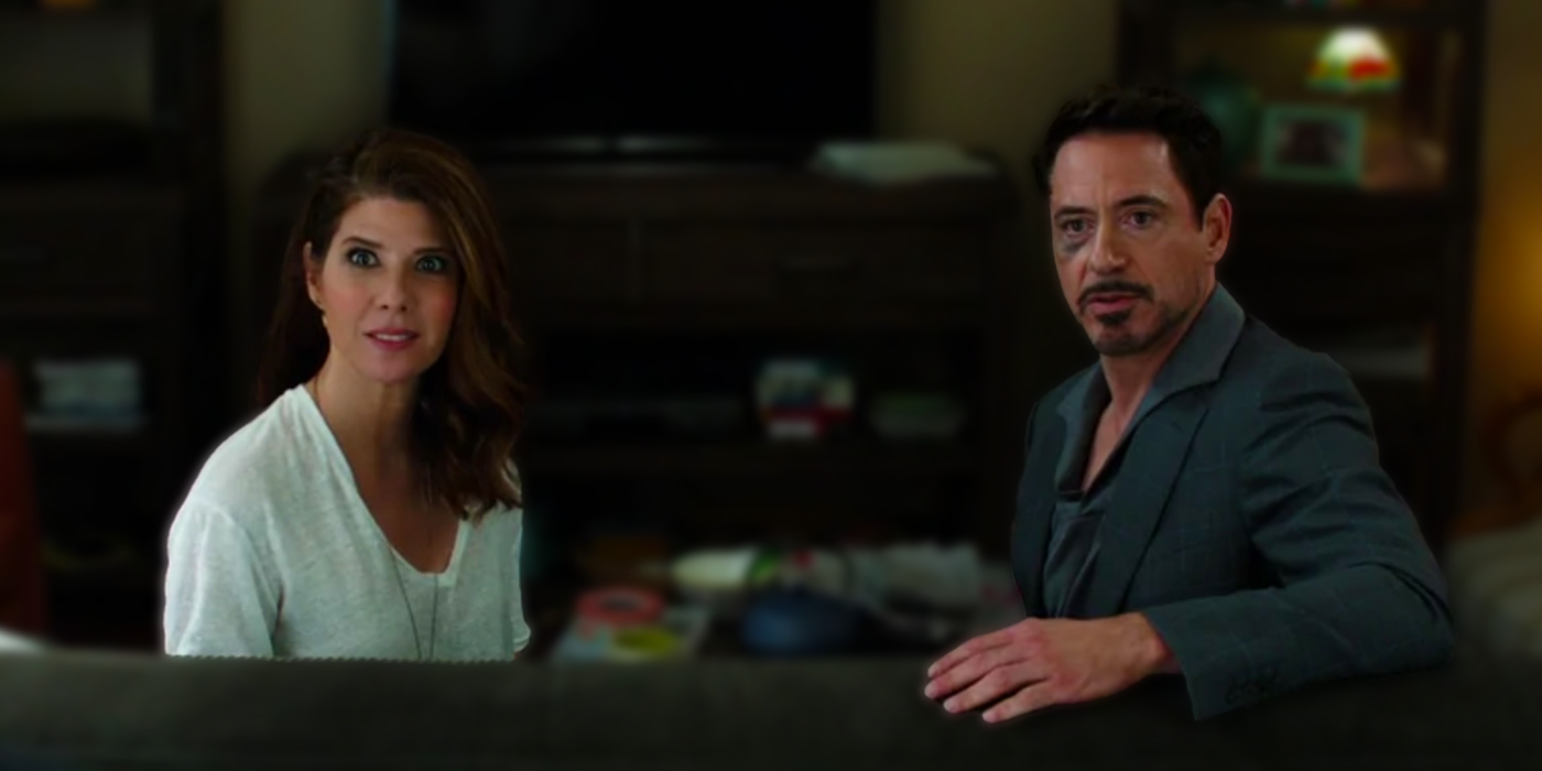 Aunt May and Tony Stark sitting on couch