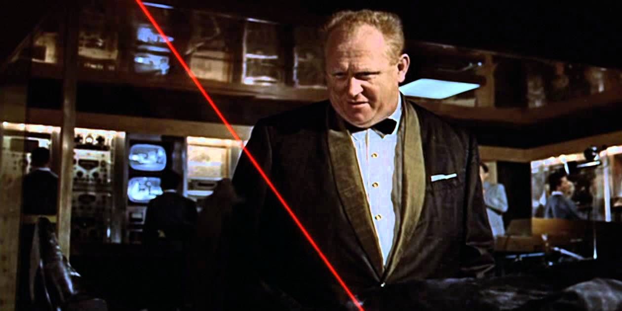 Auric Goldfinger attacks Bond with a laser beam in Goldfinger