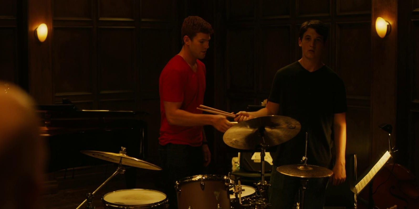 Austin Stowell playing the drums in Whiplash 