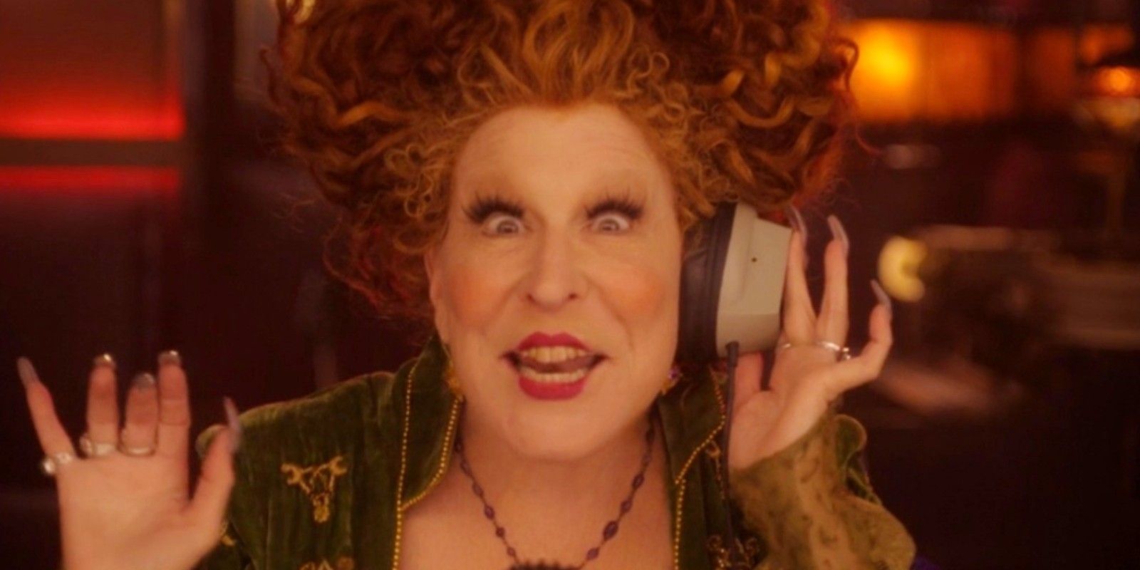 Winifred holding a phone to her ear in Hocus Pocus 2