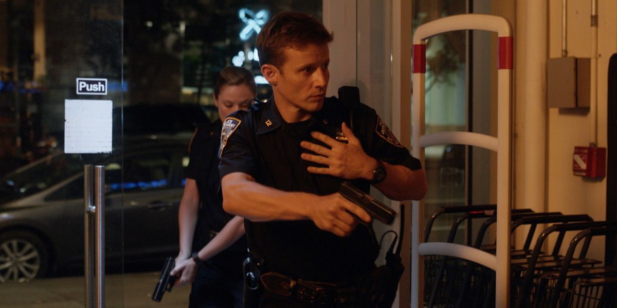 Two cops enter a building in Blue Bloods 