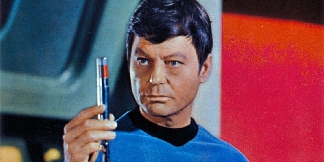 Bones holding a vial in Star Trek